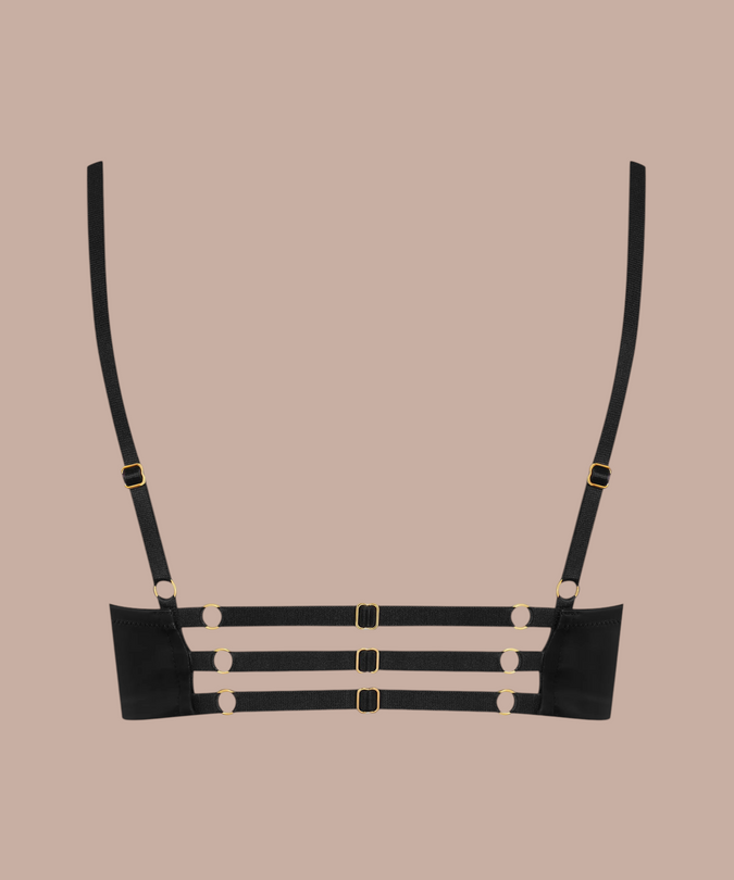Pleasurements Maison Close Chambre Noire bralette in zwart met satijnen bandjes en goudkleurige hardware op de rug