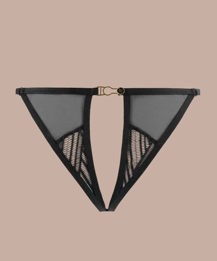 Atelier Amour – Clair Obscur Open Brief Black Model wearing black split-back briefs and matching bra, rear three-quarter view.