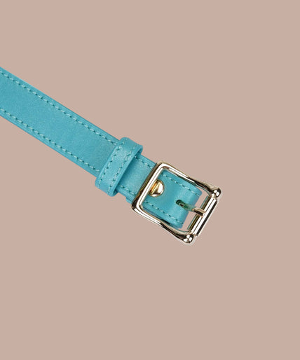 Liebe Seele Siren's Cove Lamb Leather Blindfold with Velvet Lining – Blue Front view of Liebe Seele Siren's Cove turquoise blindfold with shaped eye panel and adjustable strap.