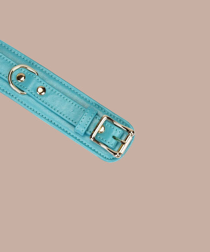 Liebe Seele Siren's Cove Lamb Leather Ankle Cuffs with Velvet Lining – Blue Pair of Liebe Seele Siren's Cove turquoise ankle cuffs connected by a gold-tone chain.