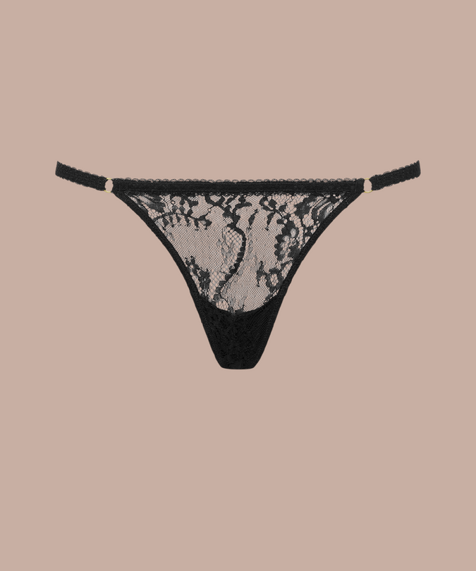 Inspiration Divine black Cross Micro Thong with a sheer floral lace panel and narrow side straps, front product view.