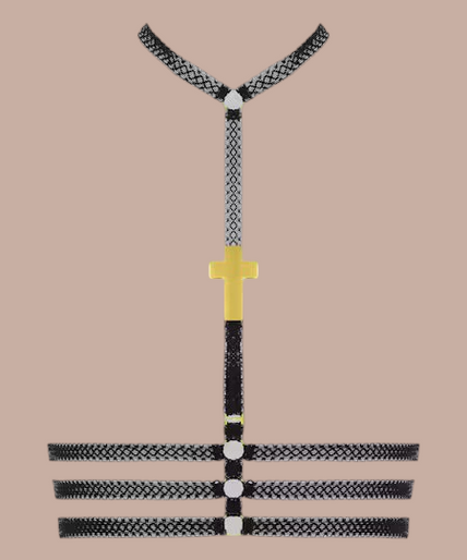 Maison Close/Scandale โ Inspiration Divine Cross Bustier Harness Black Inspiration Divine black Cross Bustier Harness with gold-tone cross detail, front view on model.