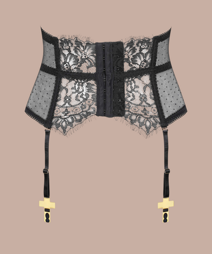 Maison Close/Scandale โ Inspiration Divine Cross Garter Belt Corset Black Inspiration Divine black Cross Garter Belt Corset with floral lace, mesh and gold-tone cross clips, front view on model with stockings.