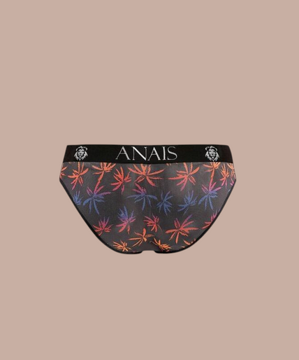 Anais Men – Chill Slip XL Pleasurements Anais Men Chill Slip met tropische print en zwarte tailleband gedragen door een model