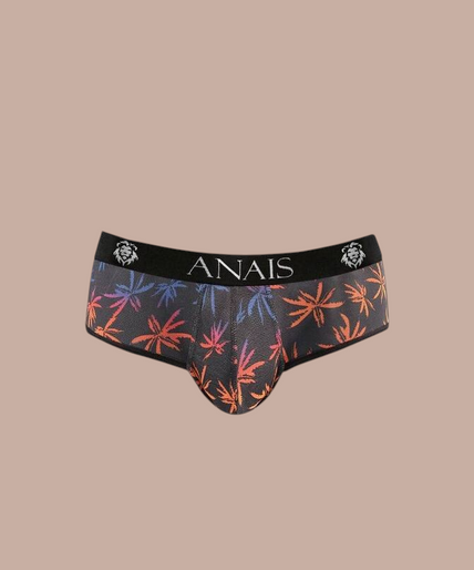 Anais Men – Chill Jock Bikini | Premium Men’s Underwear Pleasurements Anais Men Chill Jock Bikini met palmboomprint en zwarte tailleband gedragen door een lachend model
