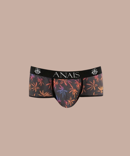 Anais Men – Chill Boxer Brief S Pleasurements Anais Men Chill boxer brief met kleurrijk bladmotief en elastische tailleband gedragen door een model.