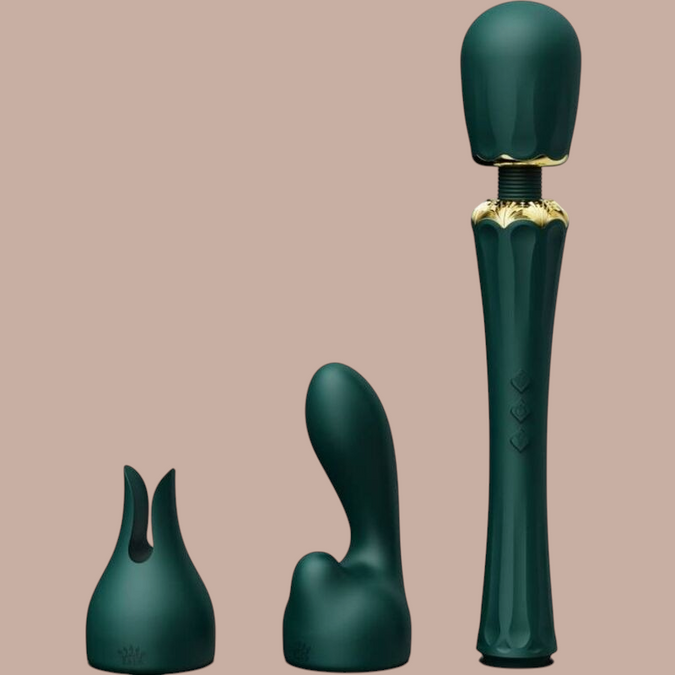 Pleasurements Zalo Kyro groene siliconen wandmassager met gouden details en verwisselbare opzetstukken