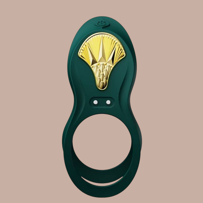 Pleasurements Zalo Bayek vibrerende koppelring in groen siliconen met gouden Egyptisch geïnspireerd detail.