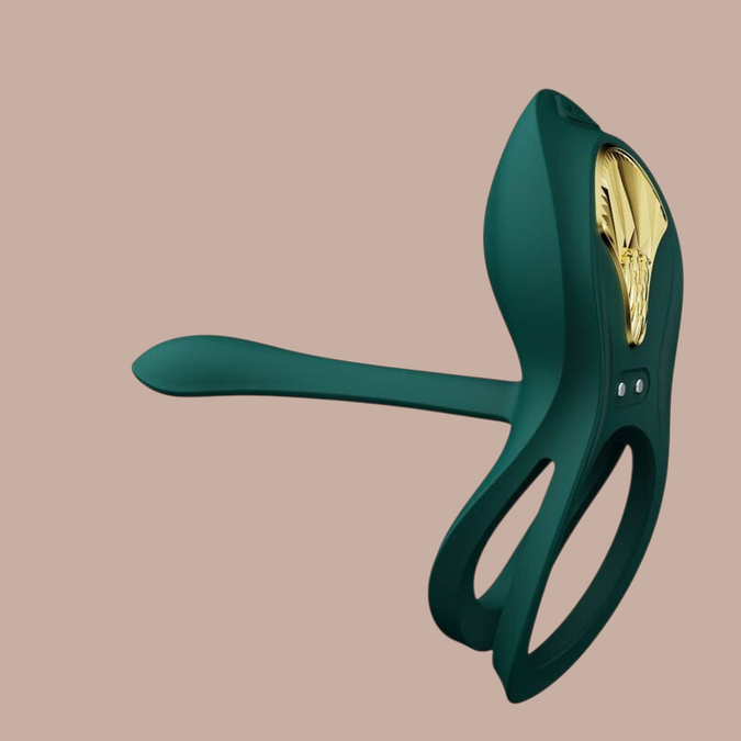 Pleasurements Zalo Bayek vibrerende koppelring in groen siliconen met gouden accenten en ergonomisch ontwerp.