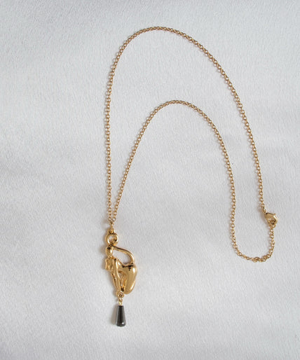Sylvie Monthulé – Secret Passion Gold Catwoman Pendant Gold Sylvie Monthulé Secret Passion gold-coloured Catwoman pendant with a dark teardrop bead on a chain.