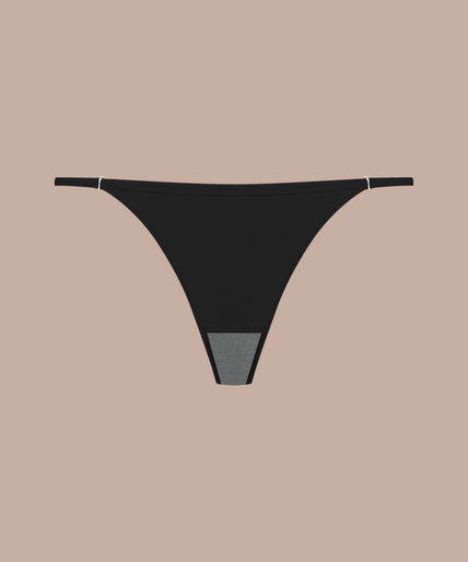 Pleasurements Scandale Nuit Fauve zwarte open string gedragen door model in profiel voor een verleidelijke look