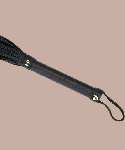 Liebe Seele Demon's Kiss black flogger with narrow tails, smooth handle and wrist loop.