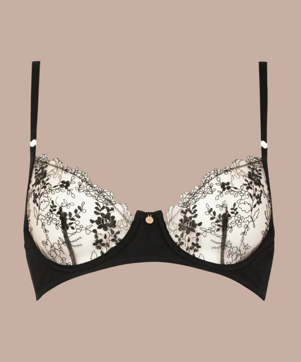 Model wearing the Atelier Amour Après Minuit black sheer embroidered half cup Bra and matching briefs.