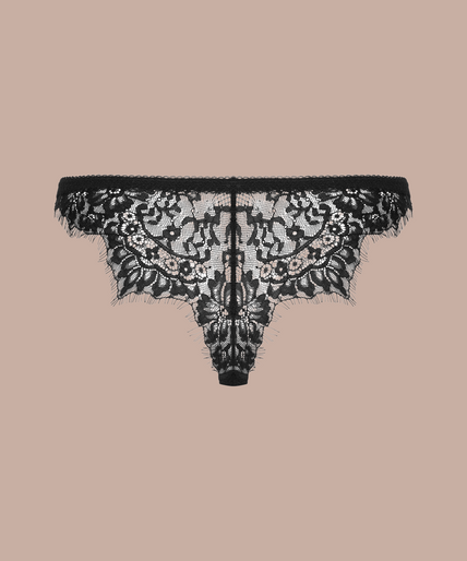 Inspiration Divine black Panty with sheer dotted mesh and floral lace panels, front view on model.
