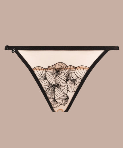 Three-quarter front view of model wearing black Menu Plaisir floral bralette and matching open briefs.