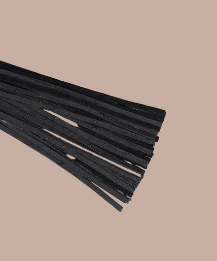 Liebe Seele Demon's Kiss black flogger with narrow tails, smooth handle and wrist loop.