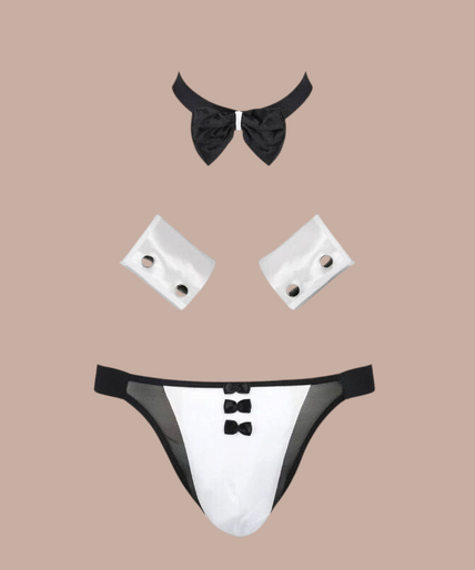 Pleasurements Passion 036 Slip Alfrojo zwarte herenslip met witte accenten, strikje en manchetten voor een sensuele look