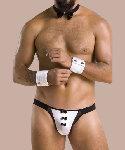 Pleasurements Passion 036 Slip Alfrojo zwarte herenslip met witte accenten, strikje en manchetten voor een sensuele look