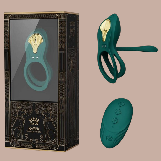 Pleasurements Zalo Bayek groene siliconen vibrerende koppelring met gouden accenten en afstandsbediening in verpakking