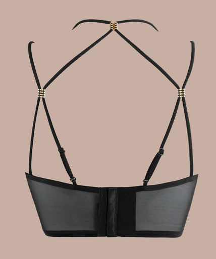 Pleasurements Atelier Amour Sans Détour zwarte kanten bustier met verfijnde details gedragen door een model